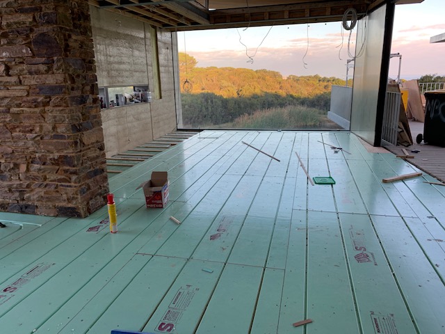 Warmboard panels laid across an open living area in a new home at Kilcunda Victoria, before the floor covering
