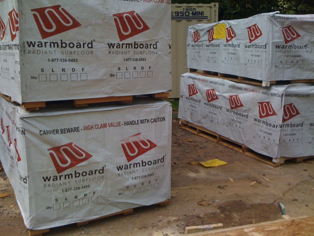 Pallets of Warmboard-S panels delivered to a building site
